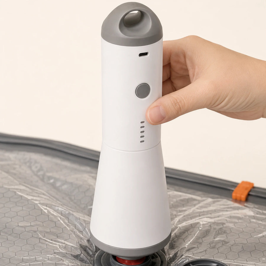 White and gray SG-508 pump connected to the valve of a gray compression bag.