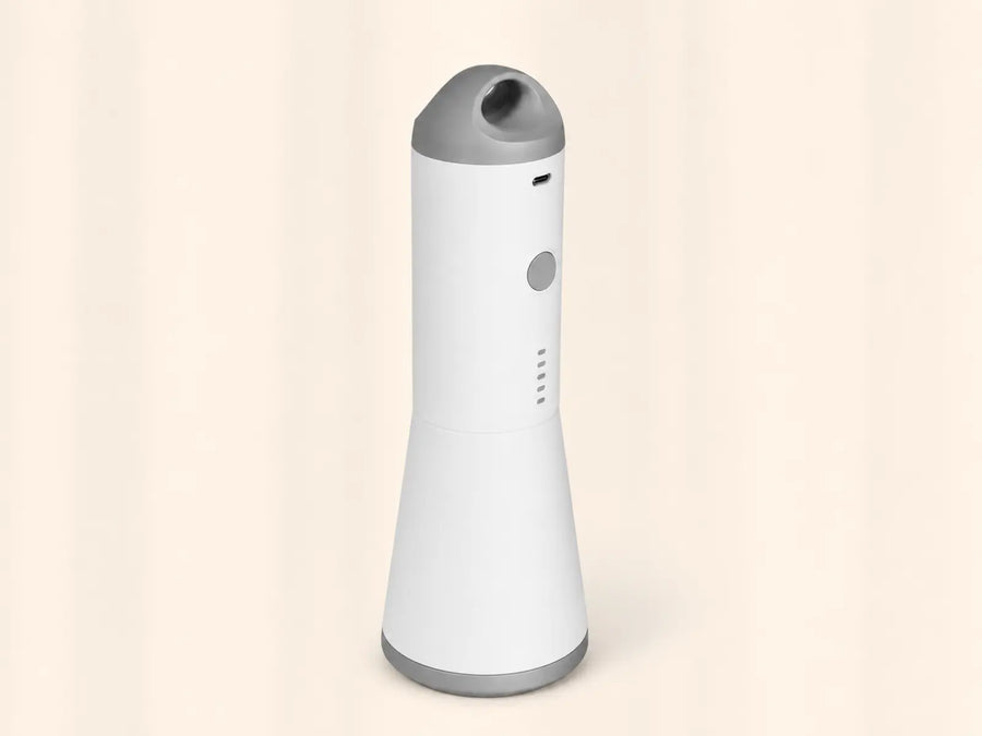 White and gray SG-508 electric pump included with the Looma Travel Compression Kit.
