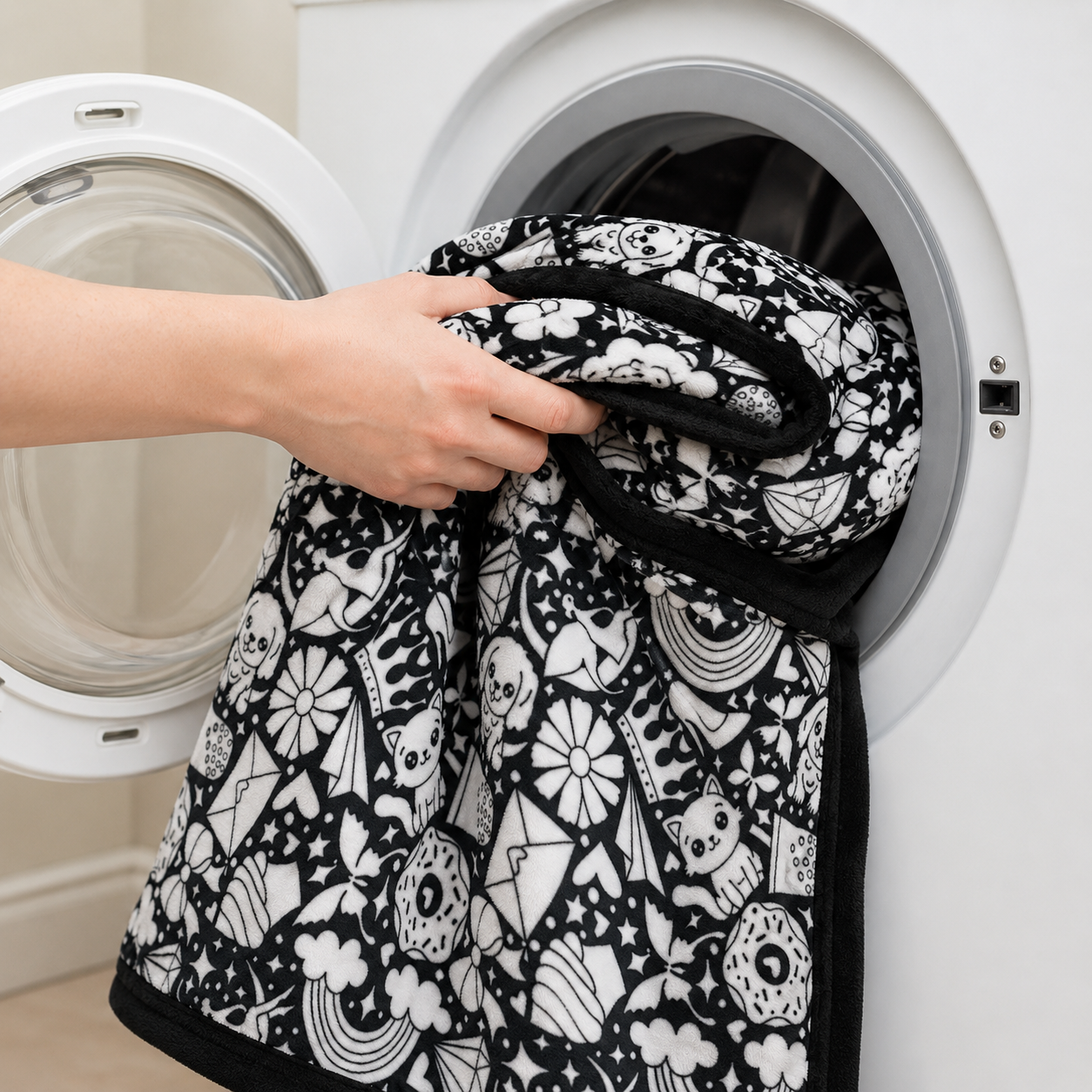 CozyCanvas Blanket being placed in a washing machine to wash clean and reuse