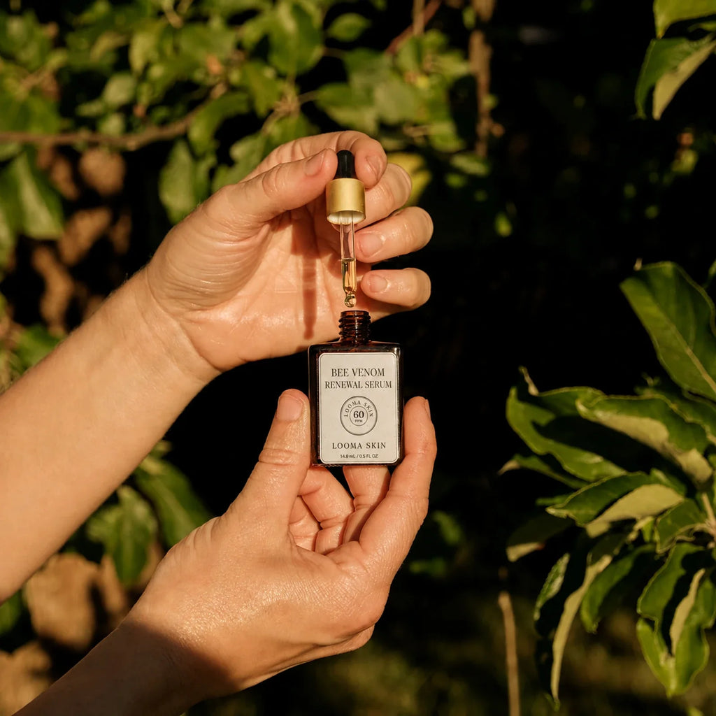Looma Skin Bee Venom Renewal Serum dropper and serum application