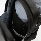Open interior of the Looma magnetic gym bag showing organizational storage