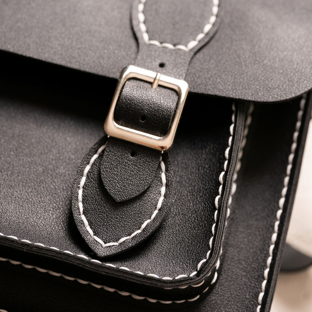 Liliora Black buckle and stitching detail