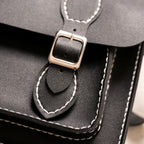 Liliora Black buckle and stitching detail