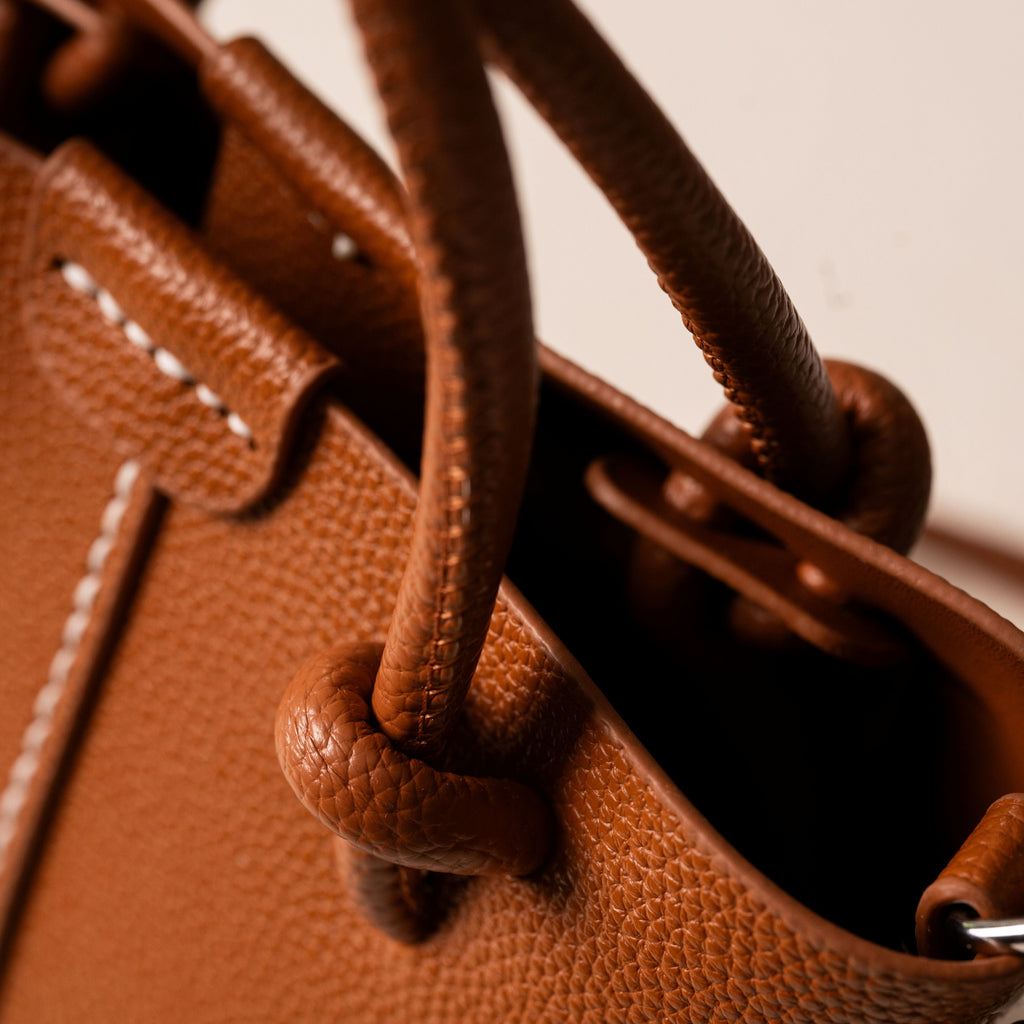Aurea Brown handle knots and material detail