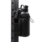 Black Looma magnetic gym bag with bottle holder attached to a compatible steel gym rack