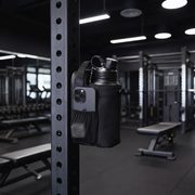 Black magnetic gym bag attached to a steel rack in a gym